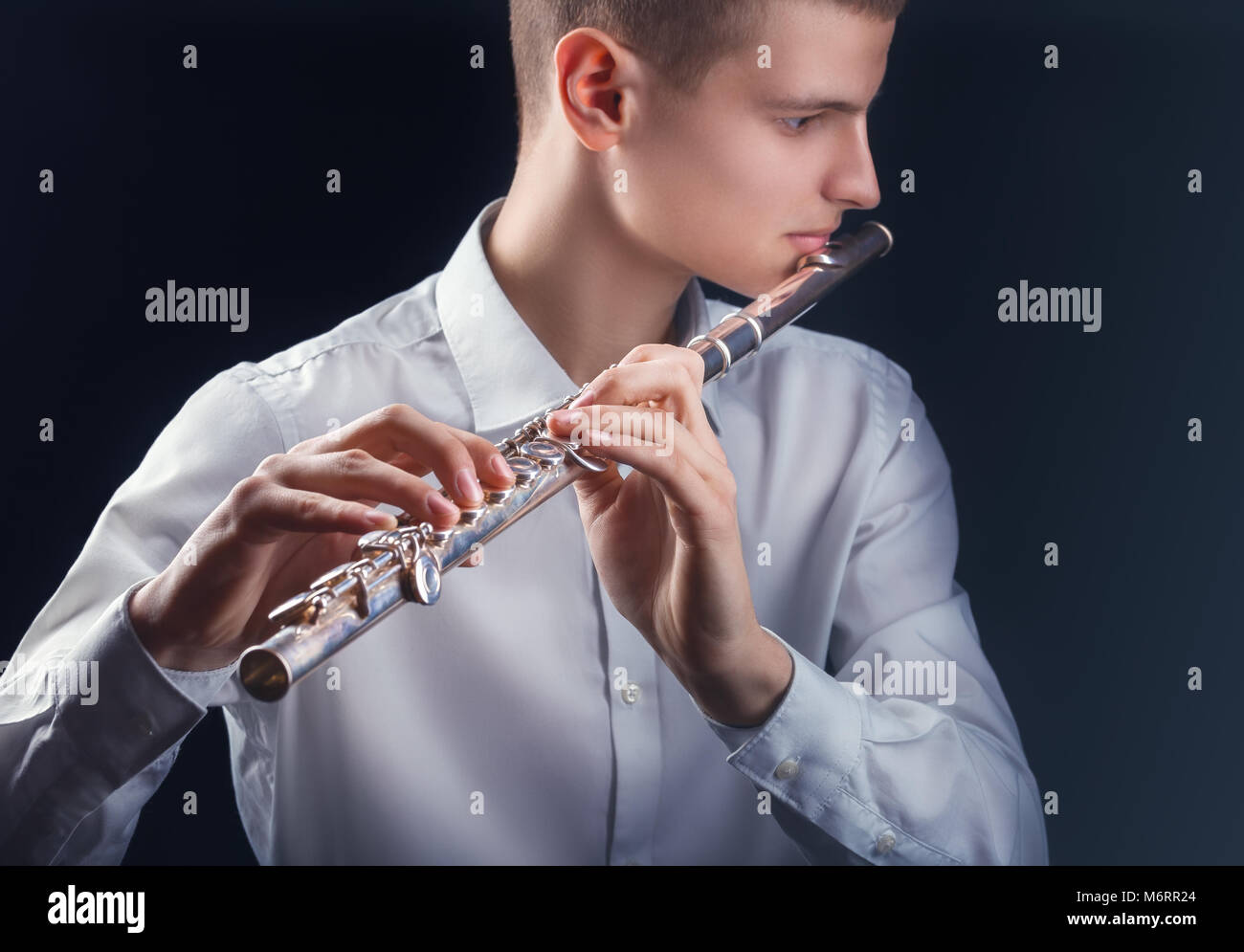 Man playing the flute hires stock photography and images Alamy