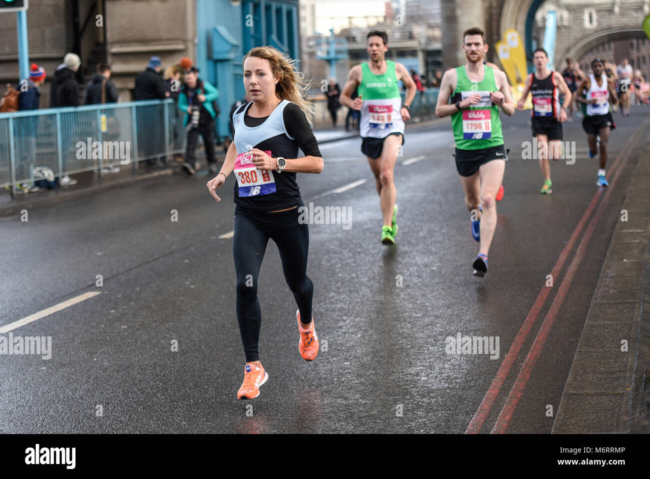 Emily Waugh 380 running in the Vitality Big Half marathon crossing Tower Bridge, London, UK Stock Photo