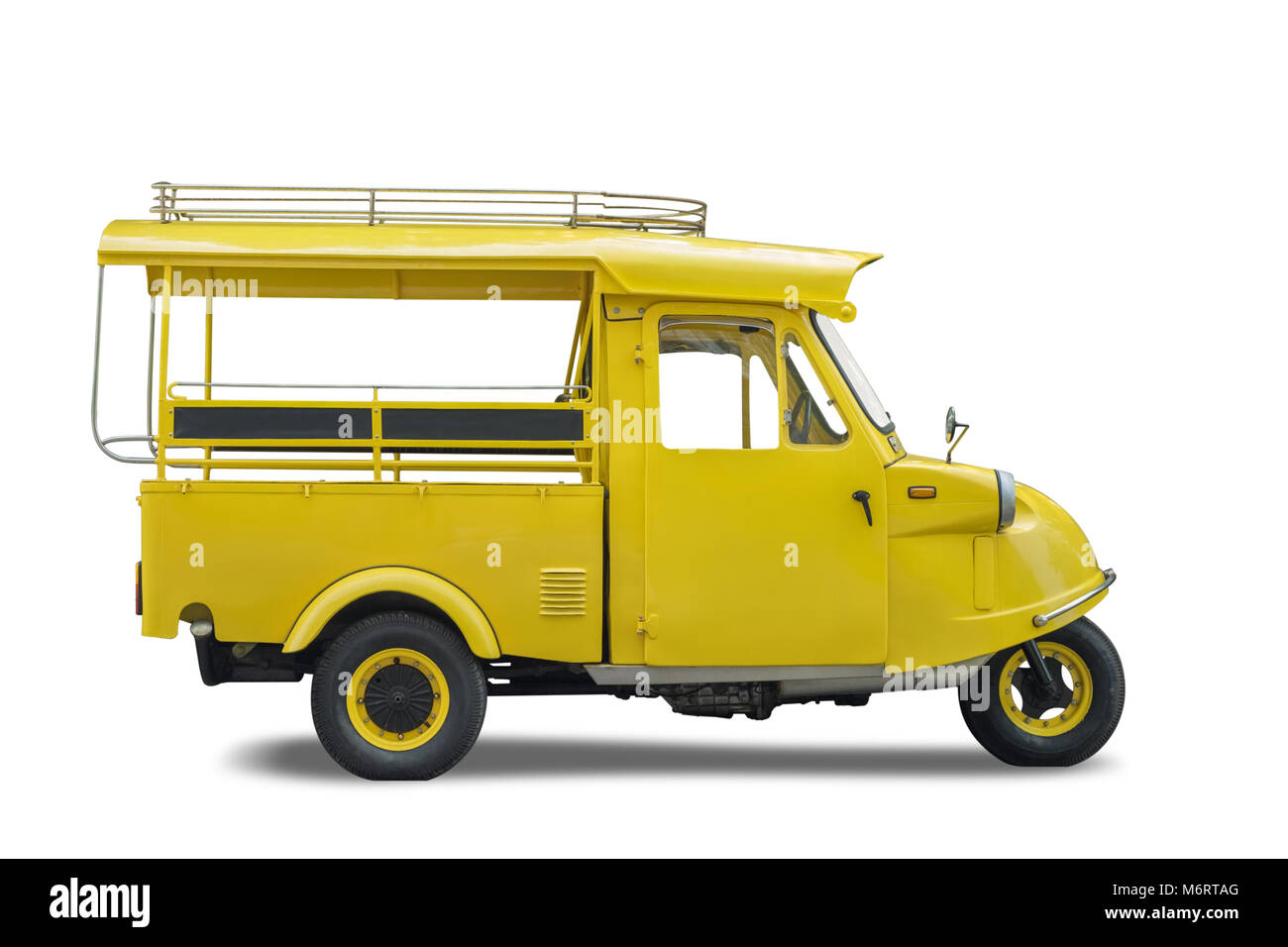 Vintage yellow auto rickshaw taxi, Thailand native taxi call 'tuk-tuk', Isolated on white background, Clipping path included Stock Photo