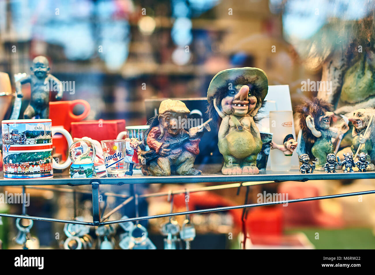 Traditional Norwegian troll figures at the display window of a souvenir gift shop. Stock Photo