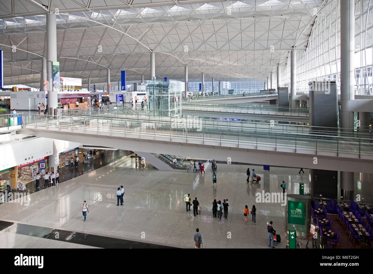 Chek Lap Kok airport, terminal building and passengers, Hong Kong, China Stock Photo