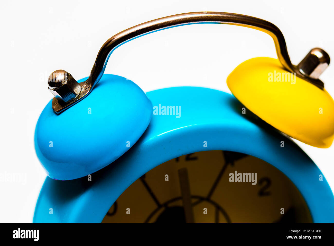 The Alarm clock isolated on white background Stock Photo - Alamy