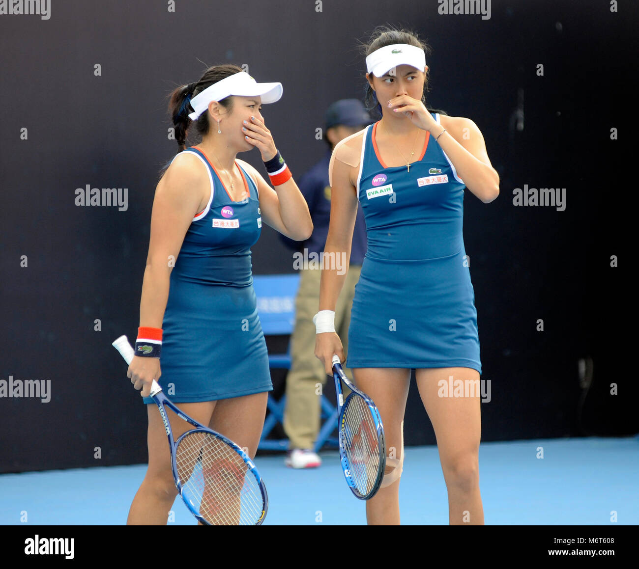 Latisha Chan Yun Jen (left) and Chan Hao Ching of Taiwan play in the women's doubles at the China Open tennis tournament in Beijing, October 2016 Stock Photo