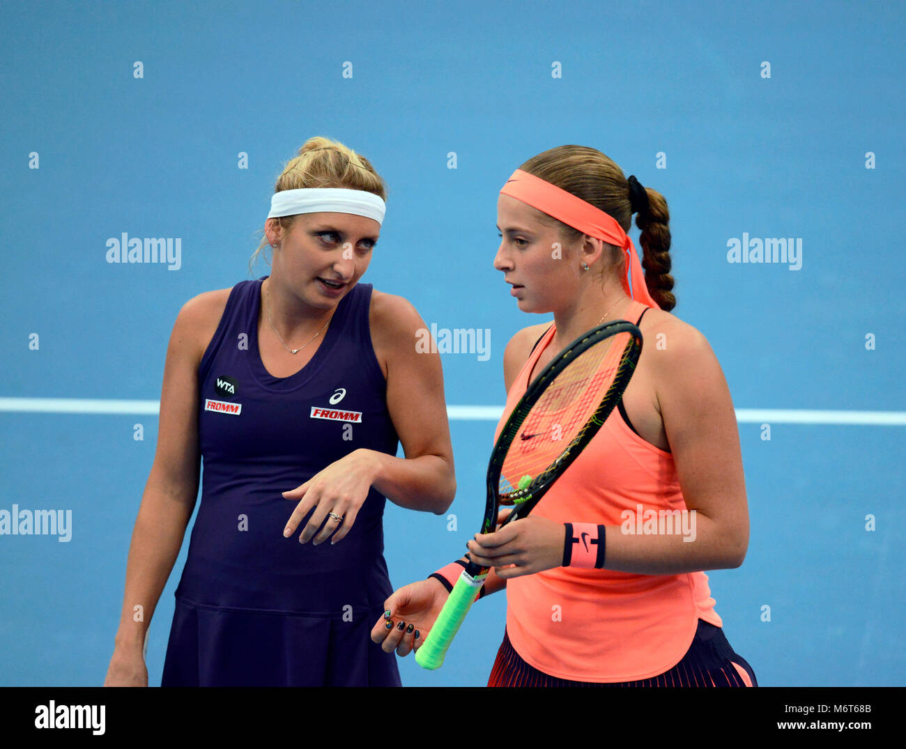 Timea Bacsinszky and Jelena Ostapenko partner vs Zhu Lin and You Xiaodi at the China Open tennis tournament in Beijing, October 2016 Stock Photo