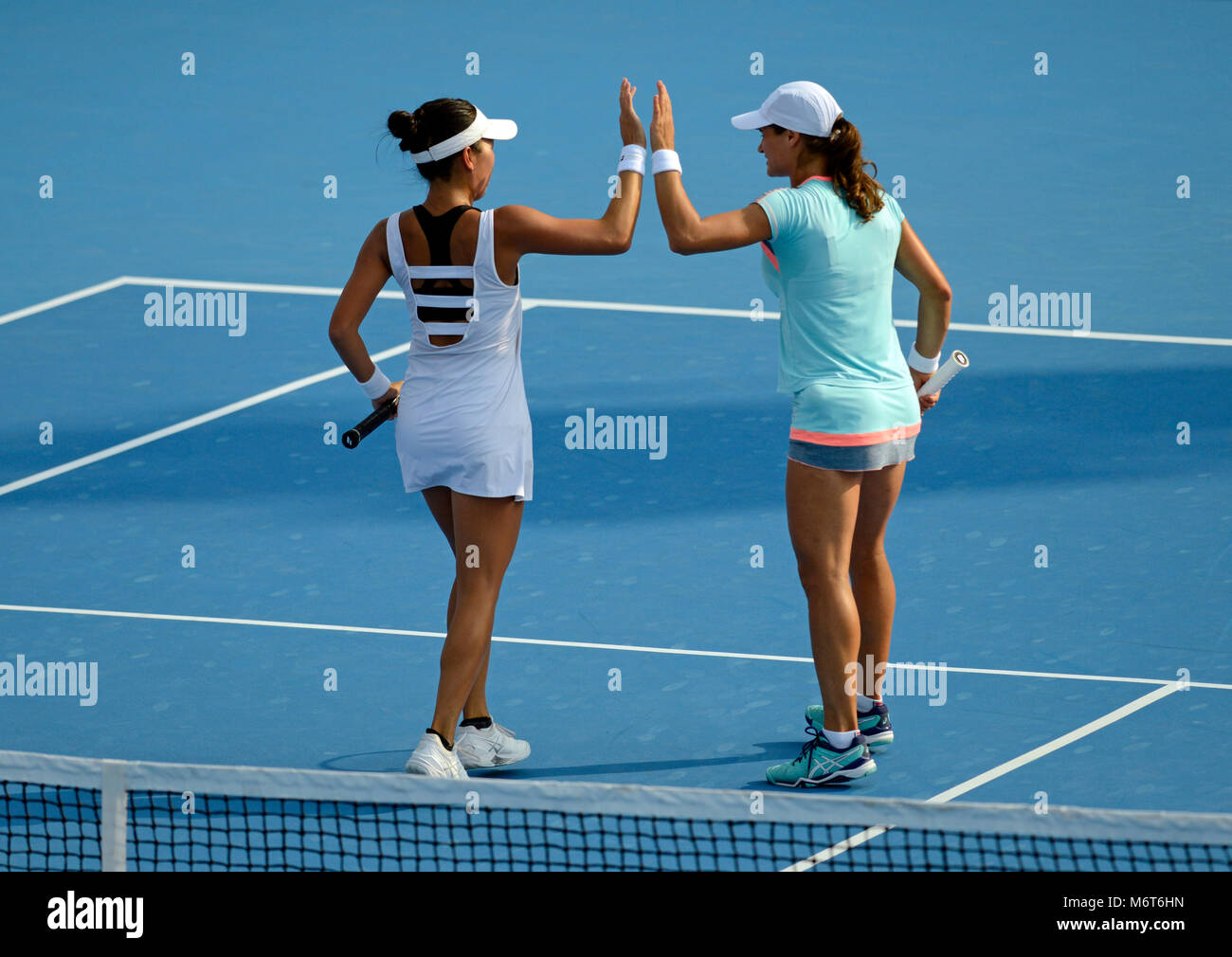 Vania King of USA and Monica Niculescu of Romania partner in the women