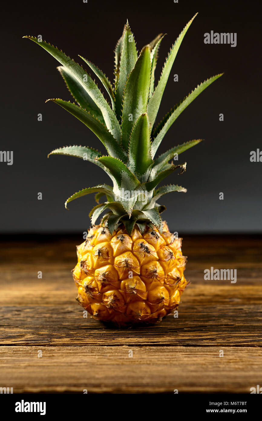 Pineapple On A Black Background Stock Photo Alamy