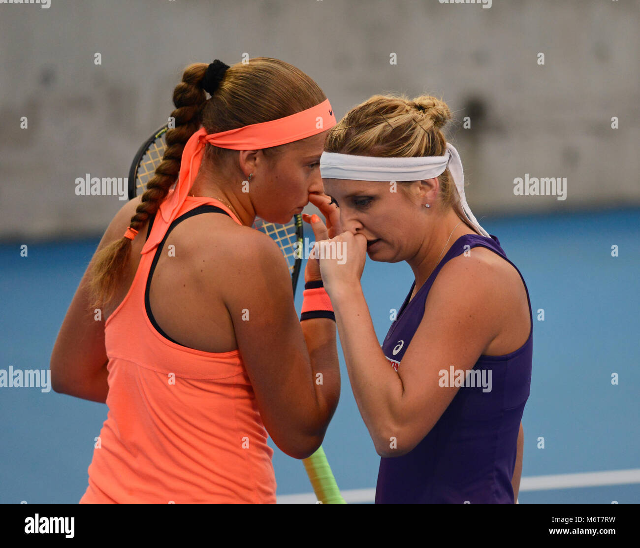 Switzerland's Timea Bacsinszky and Latvias Jelena Ostapenko partner in the womens doubles at the China Open tennis tournament in Beijing, October 2016 Stock Photo