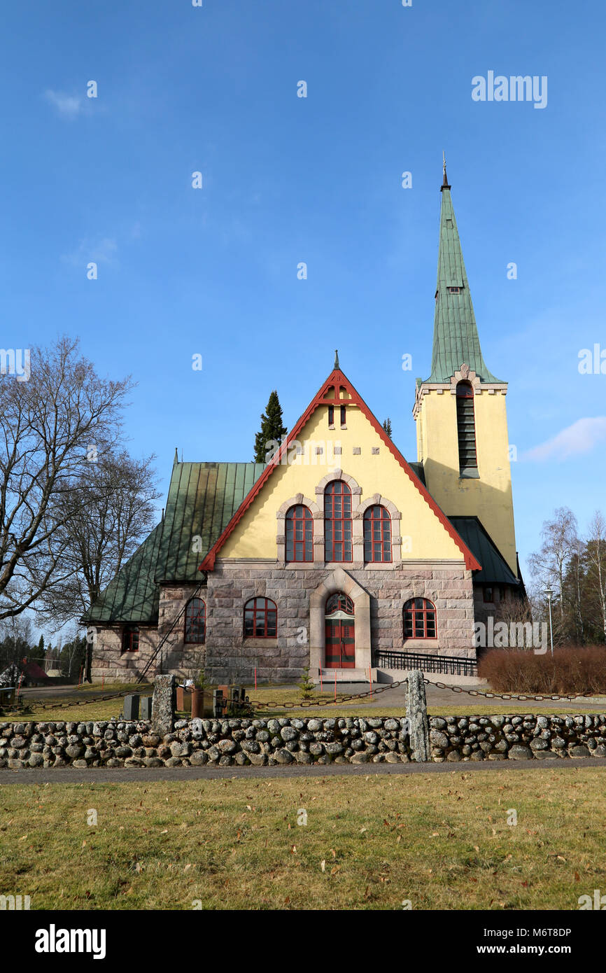 The beautiful stone church of Humppila, Finland was completed in 1922 and it represents Finnish National Romanticism or Jugend style. Stock Photo