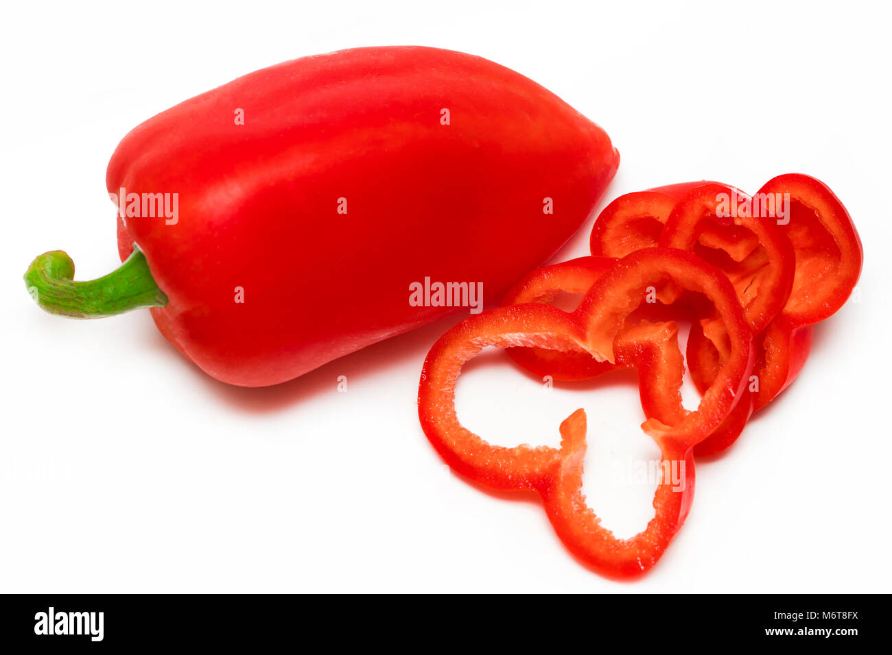 Red sweet bell pepper slices isolated on white background Stock Photo ...