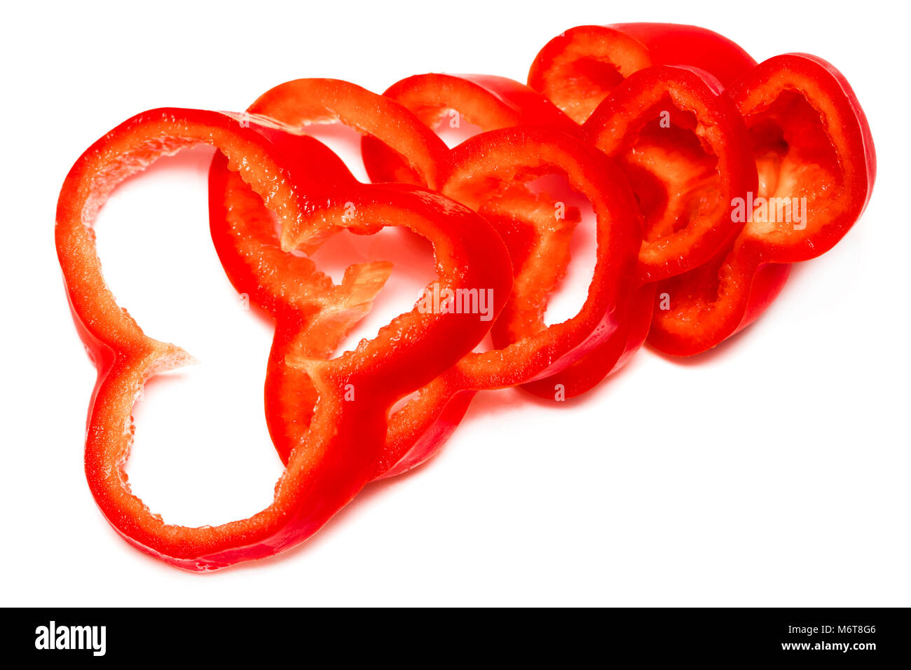 Red sweet bell pepper slices isolated on white background Stock Photo ...