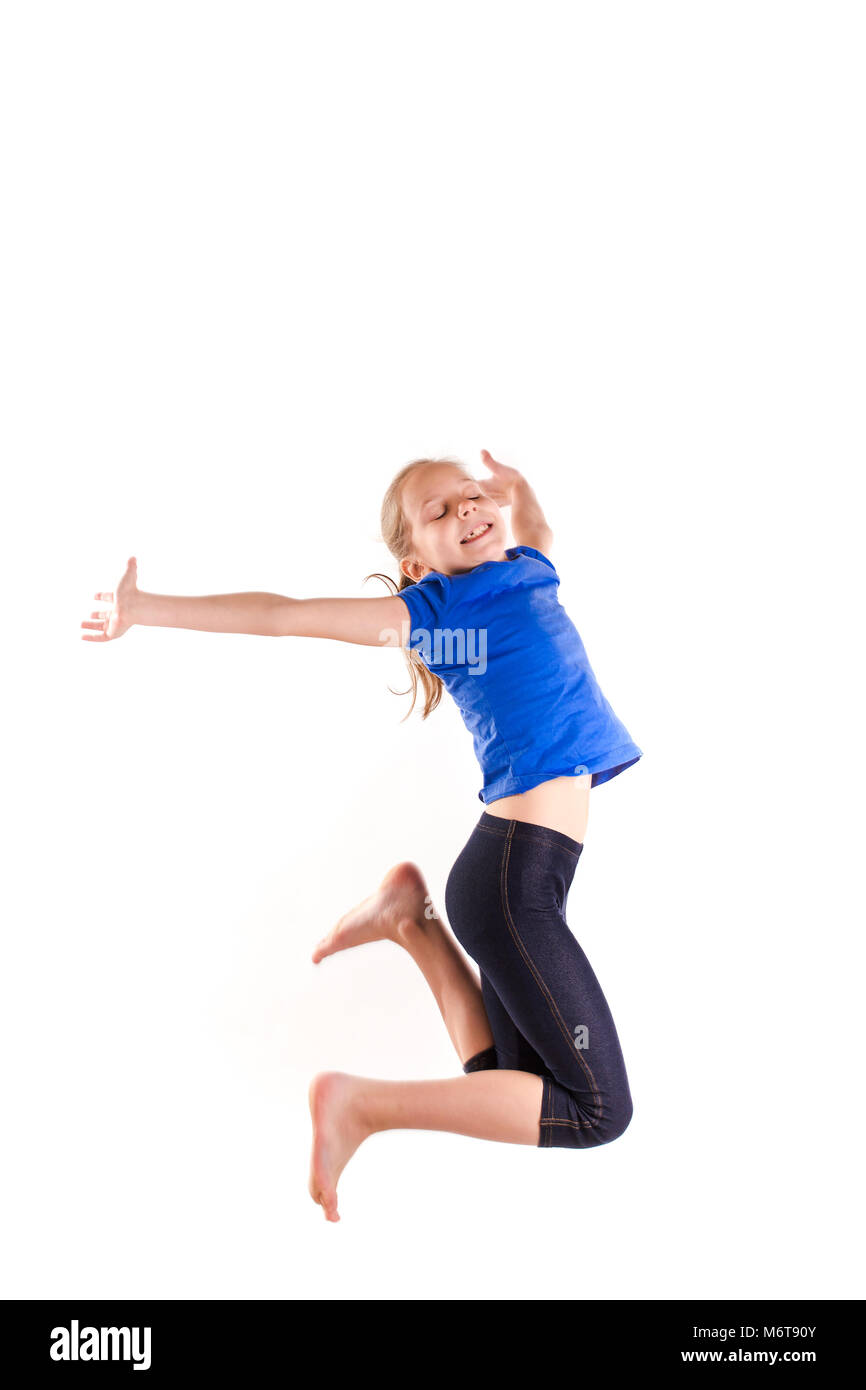 Active happy little girl jumping isolated on white Stock Photo - Alamy