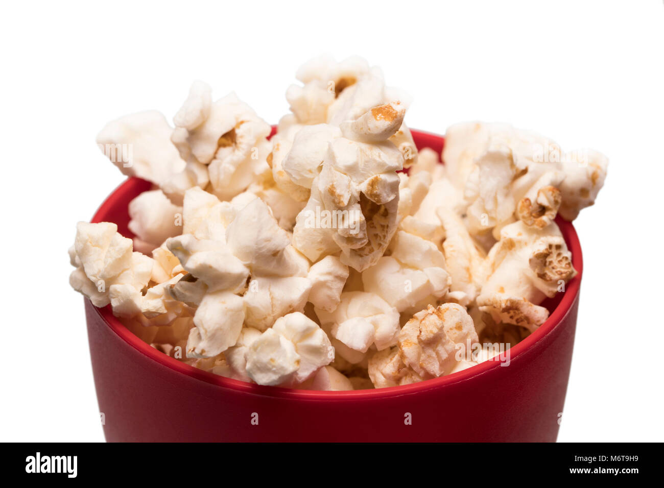 popcorn in a red bowl top view. Stock Photo