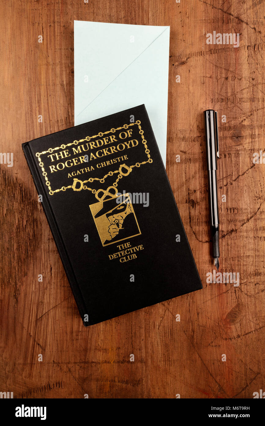The Murder of Roger Ackroyd, detective novel by Agatha Christie, with blue envelope and ink pen Stock Photo