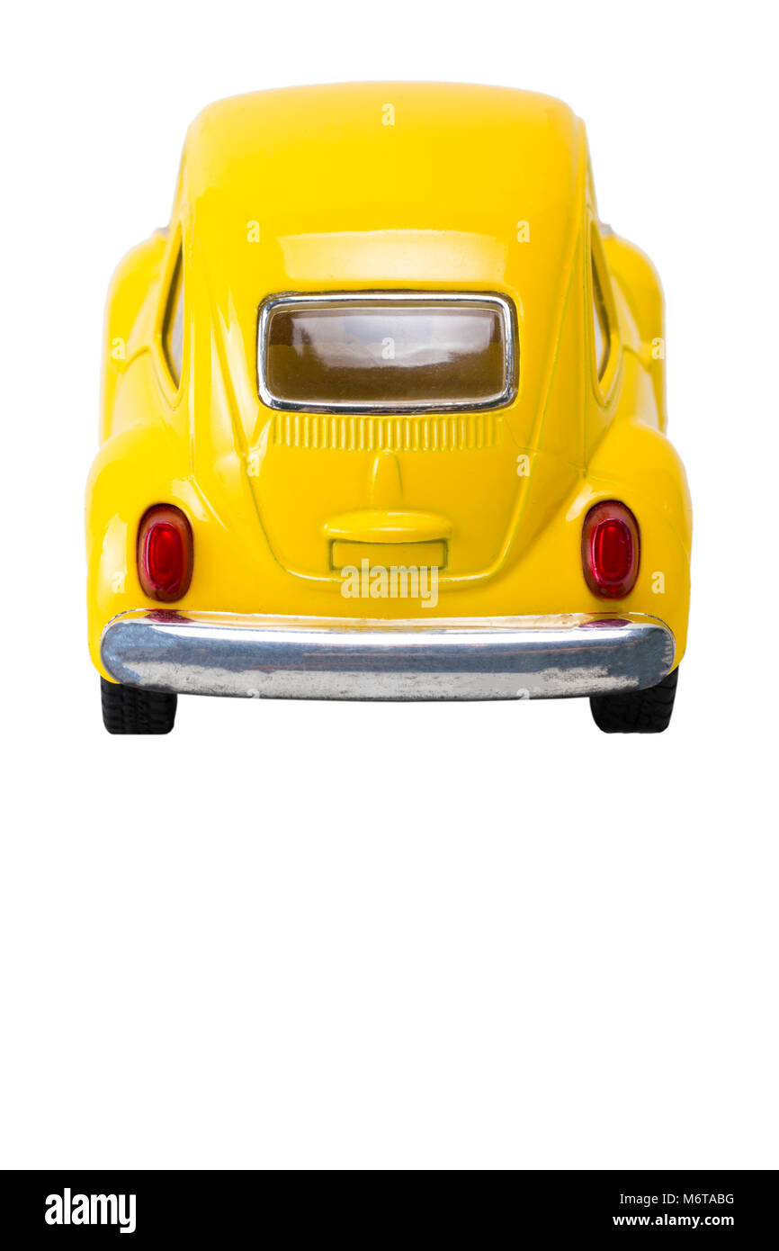 The Yellow retro car isolated on white background rear view. Stock Photo
