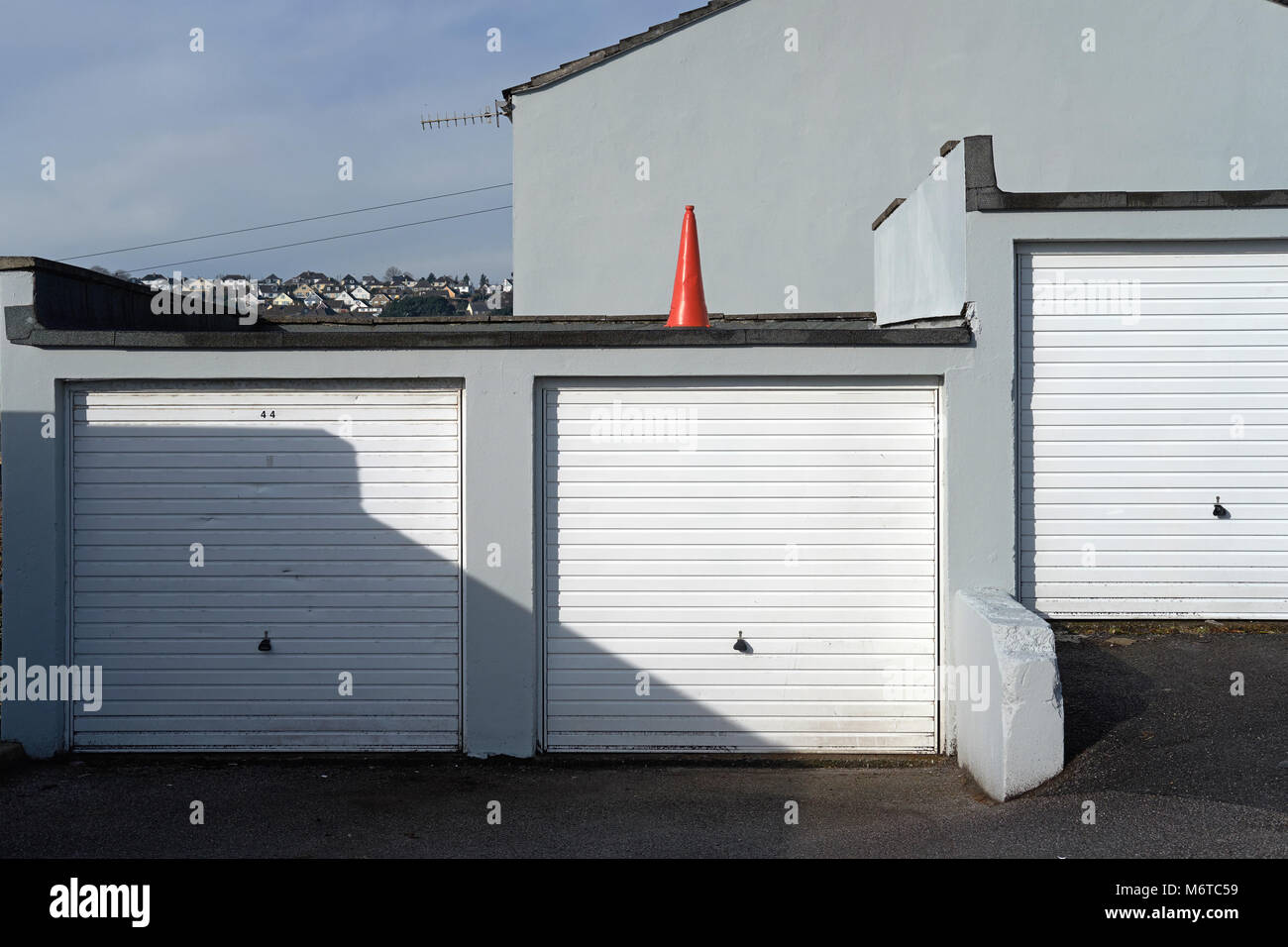 A traffic bollard on a garage roof Stock Photo
