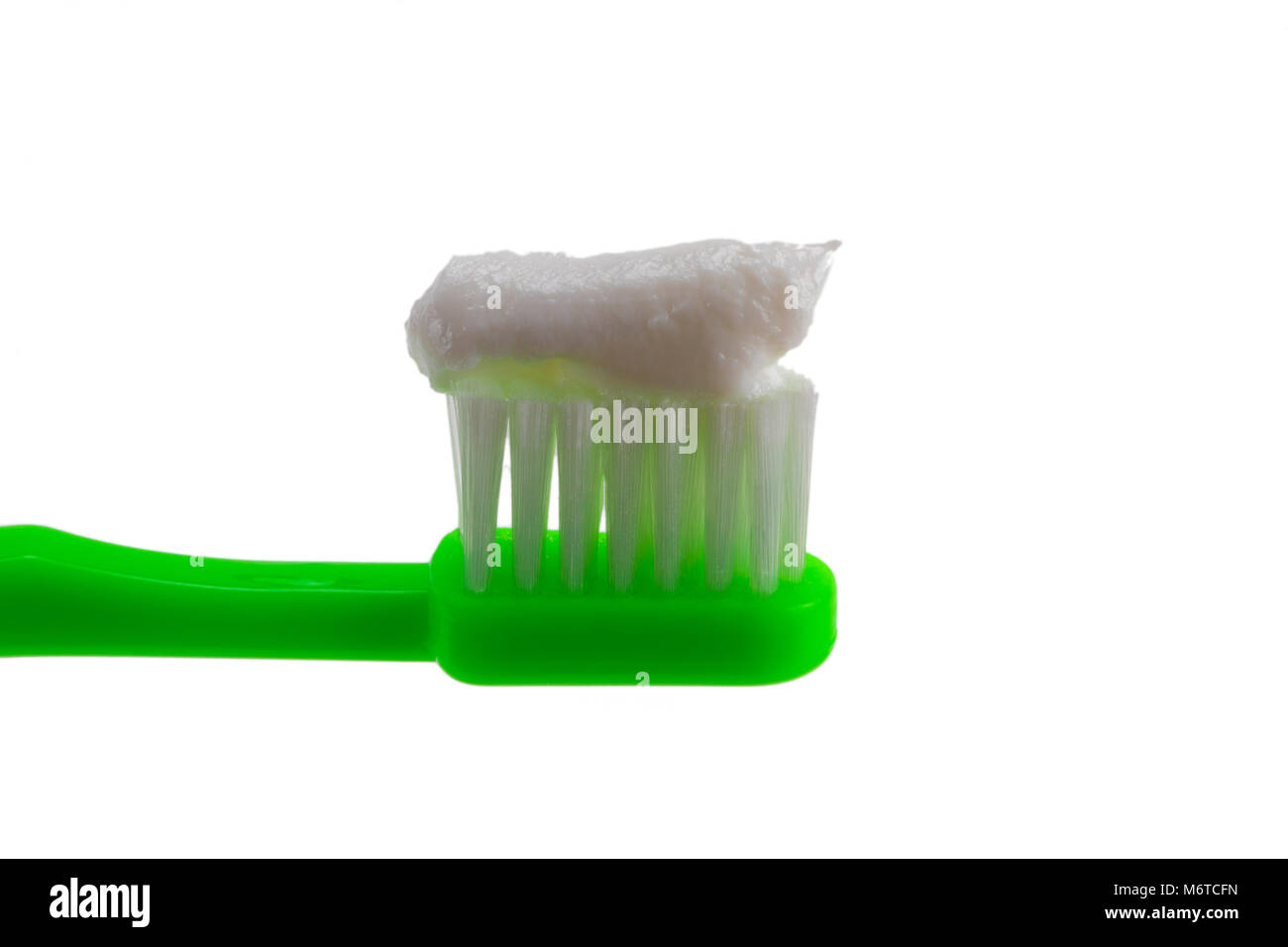 Toothbrush and toothpaste isolated on white background Stock Photo - Alamy