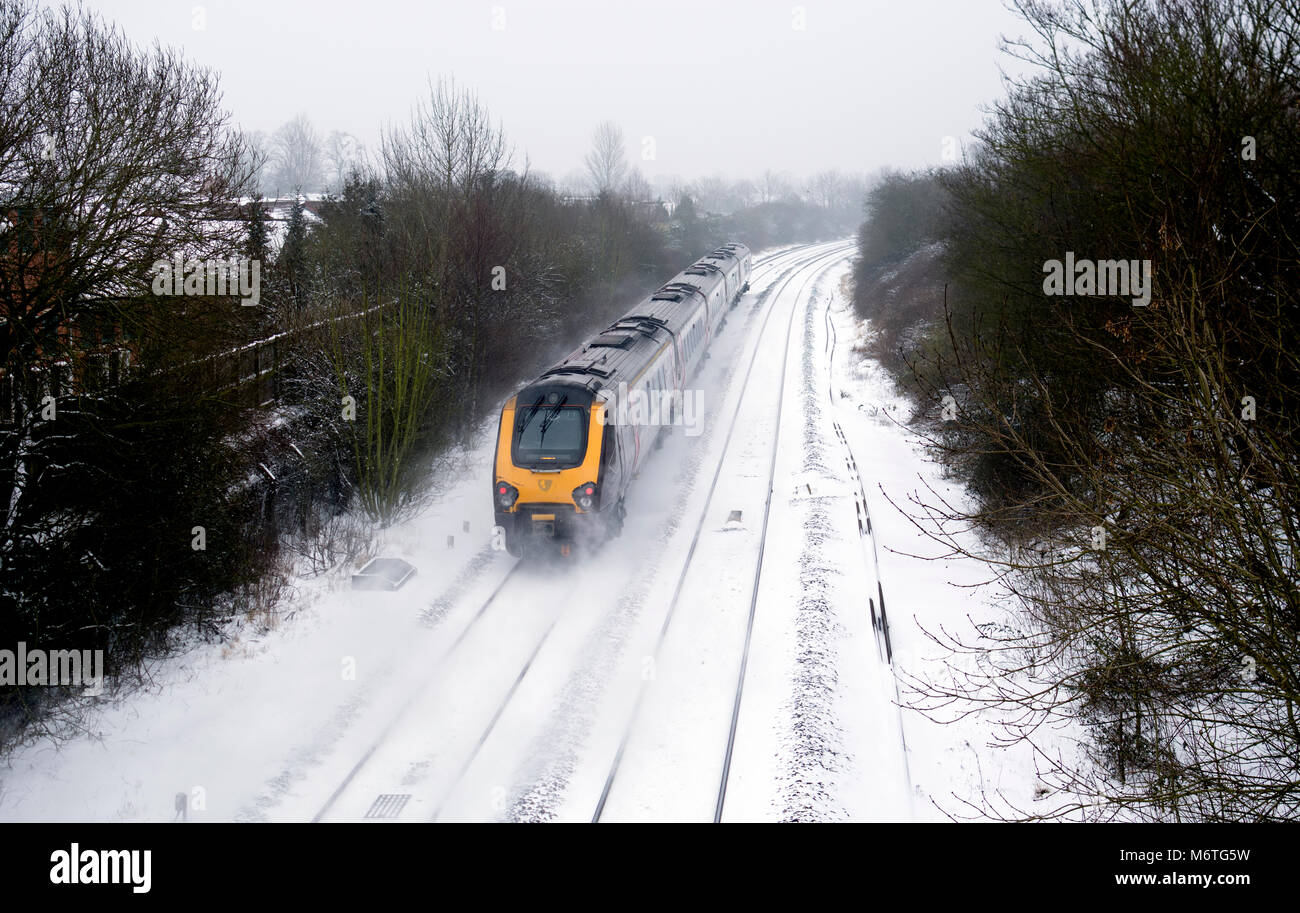 Arriva CrossCountry Voyager diesel train in snowy weather, Warwick, UK Stock Photo