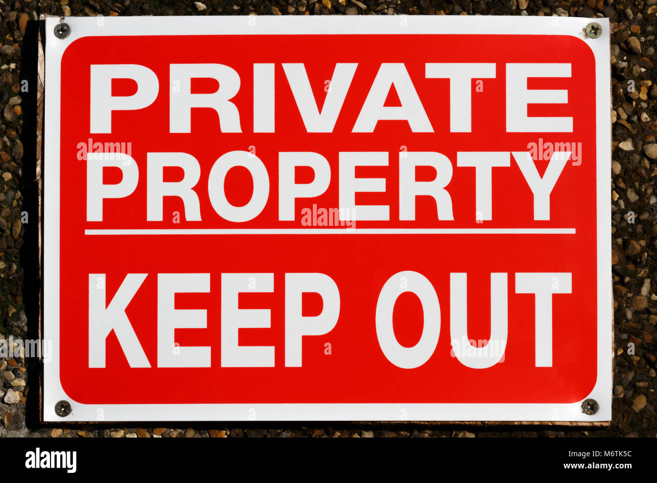 Private property keep out red sign on plastered wall Stock Photo Alamy