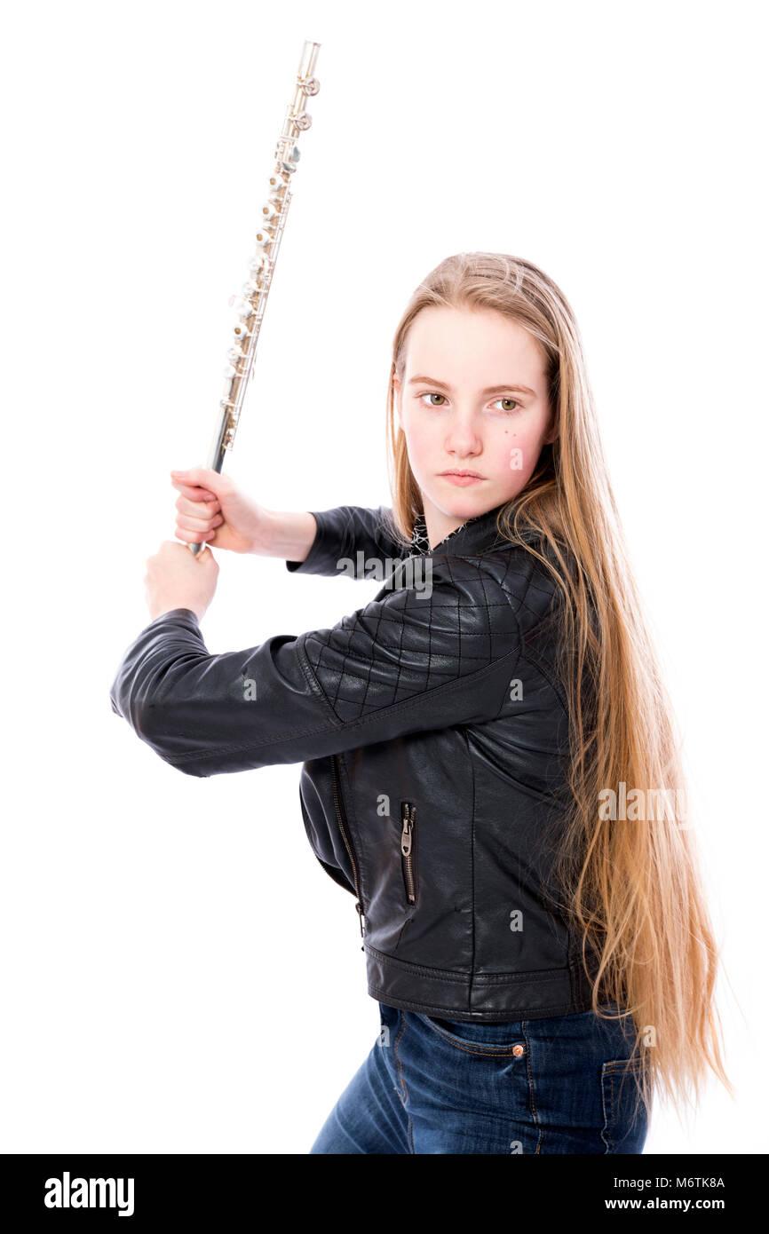 young blond teen girl with flute in studio against white background Stock Photo