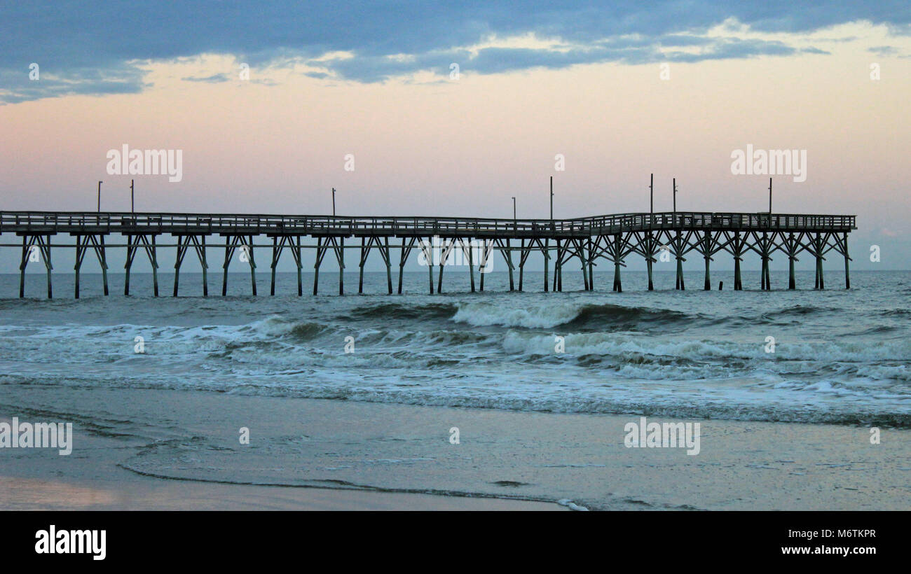 Sunset beach fishing pier hi-res stock photography and images - Alamy