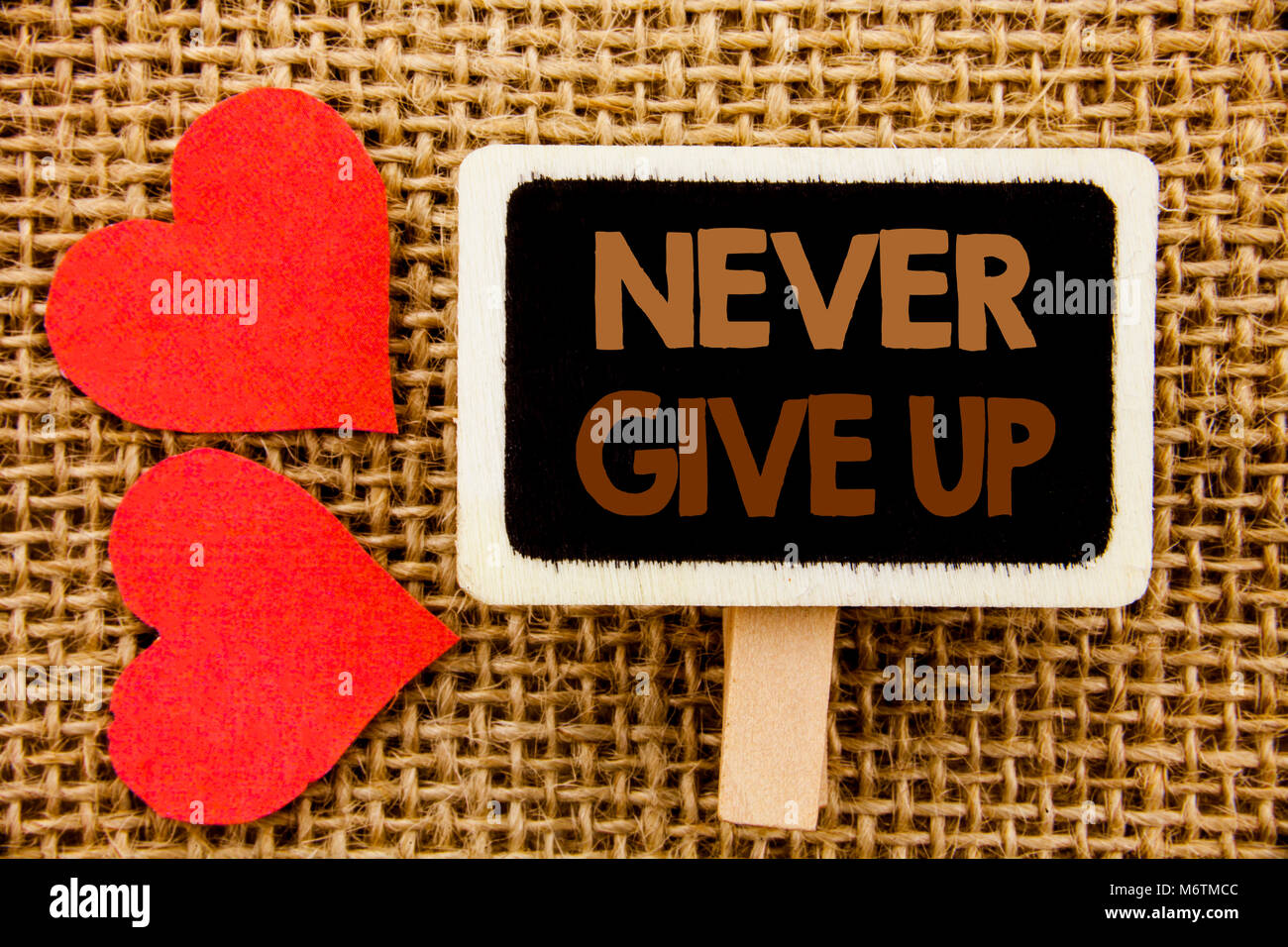 Conceptual hand text showing Never Give Up. Business photo showcasing Motivation Quote For Success Achievement Challenge written blackboard the textur Stock Photo