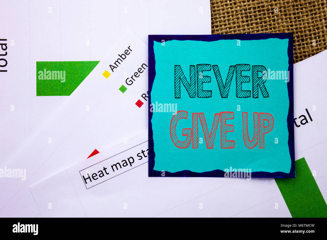 Conceptual writing text showing Never Give Up. Concept meaning Motivation Quote For Success Achievement Challenge written Sticky Note Paper the textur Stock Photo