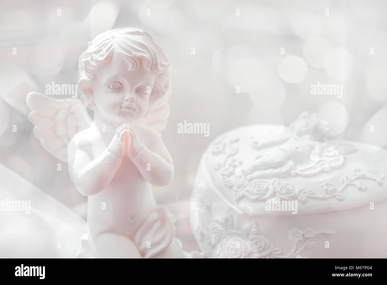 Baby angel statuette Stock Photo
