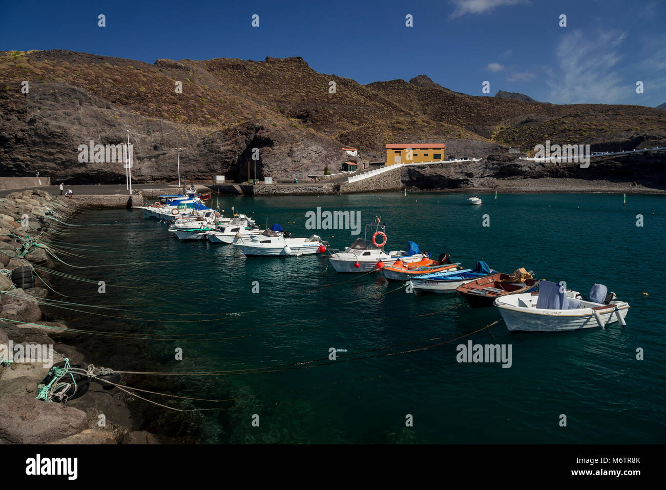 Small boats in the harbour at Puerto De La Aldea, Gran Canaria, Canary Islands Stock Photo