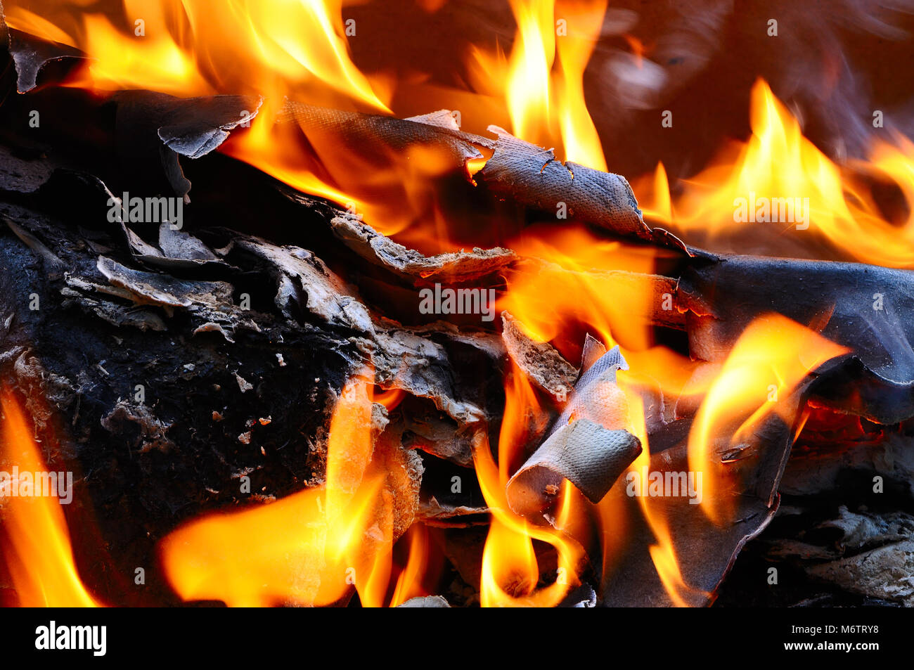 Burning cardboard in a fire Stock Photo Alamy