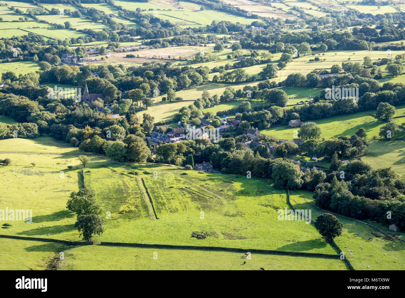 Village of Edale and the surrounding countryside seen from above. The Vale of Edale, Derbyshire, Peak District National Park, England, UK Stock Photo