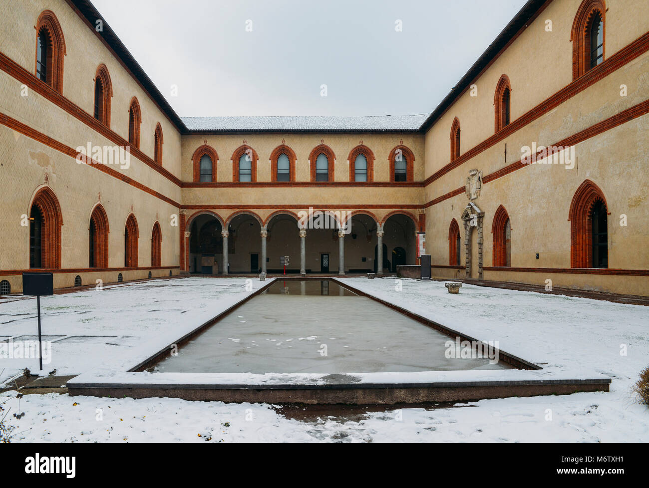Courtyard and lap pool at  Milan's Castello Sforzesco, Lombardy, Stock Photo