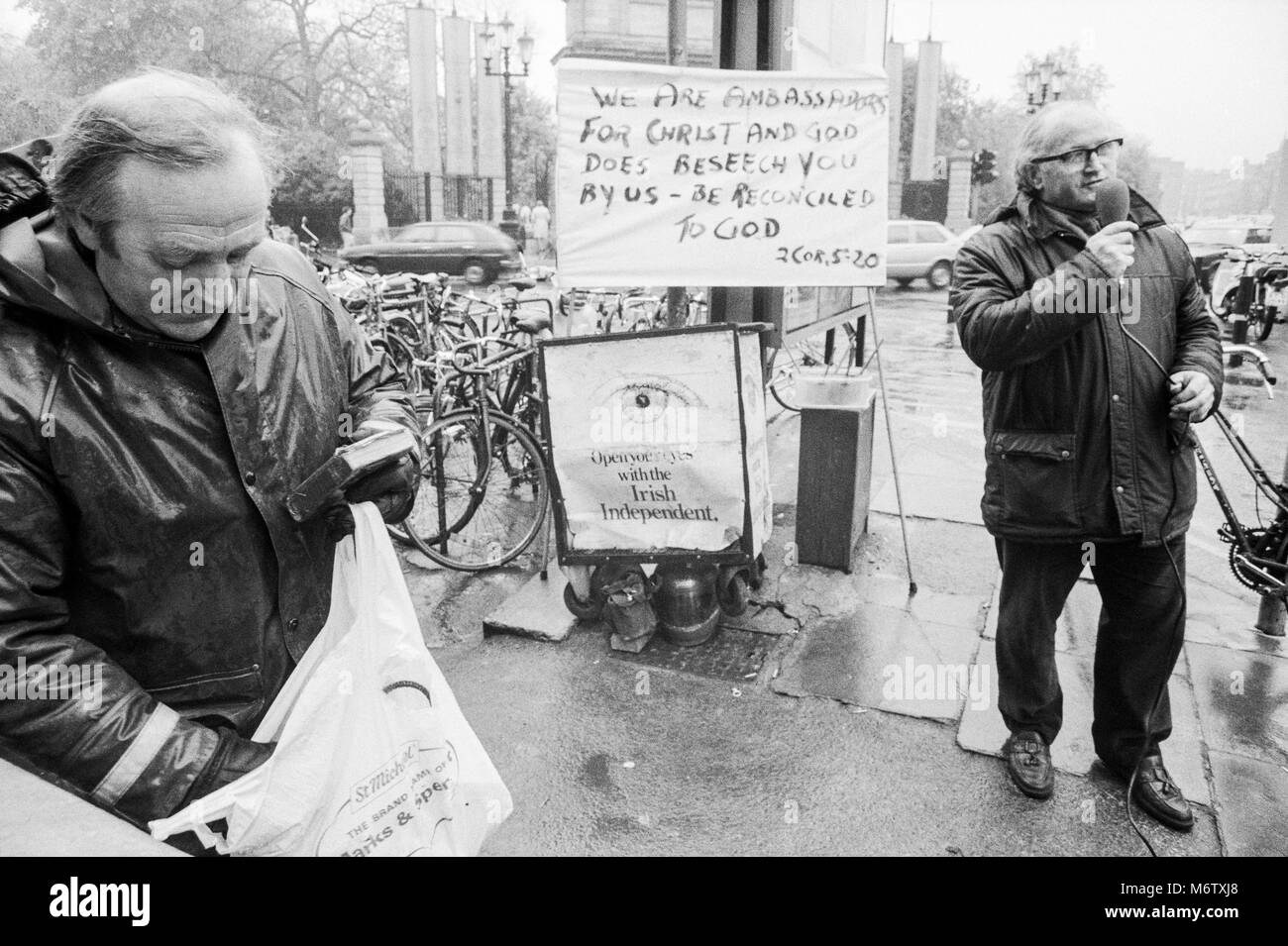 Three men preaching in the street at St Stephens Green, Dublin City Center, Ireland, Archival photograph from April 1988 Stock Photo
