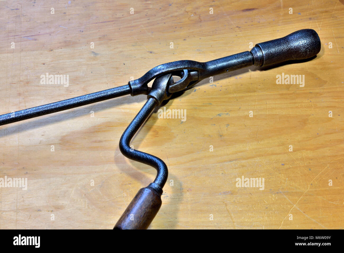 Close up of universal joint in antique hand operated corner brace drill Stock Photo
