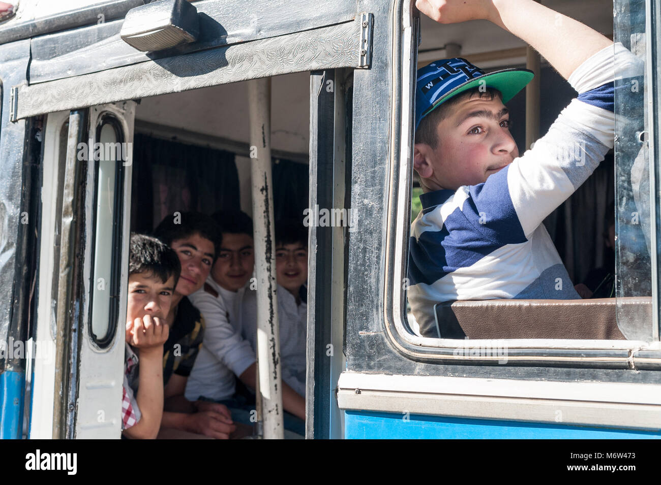 Youngsters on a local bus in Yerevan, Armenia. Stock Photo