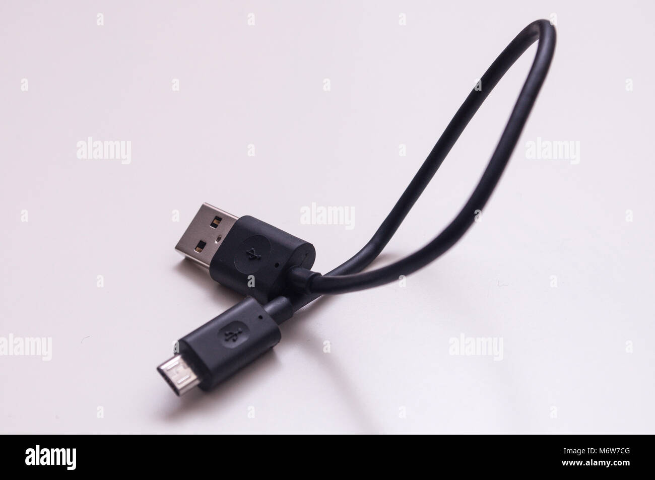USB and micro USB connector cable. Micro-USB cable connector on white background Stock Photo