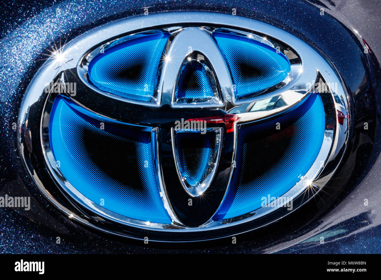 Indianapolis - Circa March 2018: Toyota blue hybrid vehicle logo and badge.  Toyota is a high quality Japanese auto manufacturer III Stock Photo - Alamy