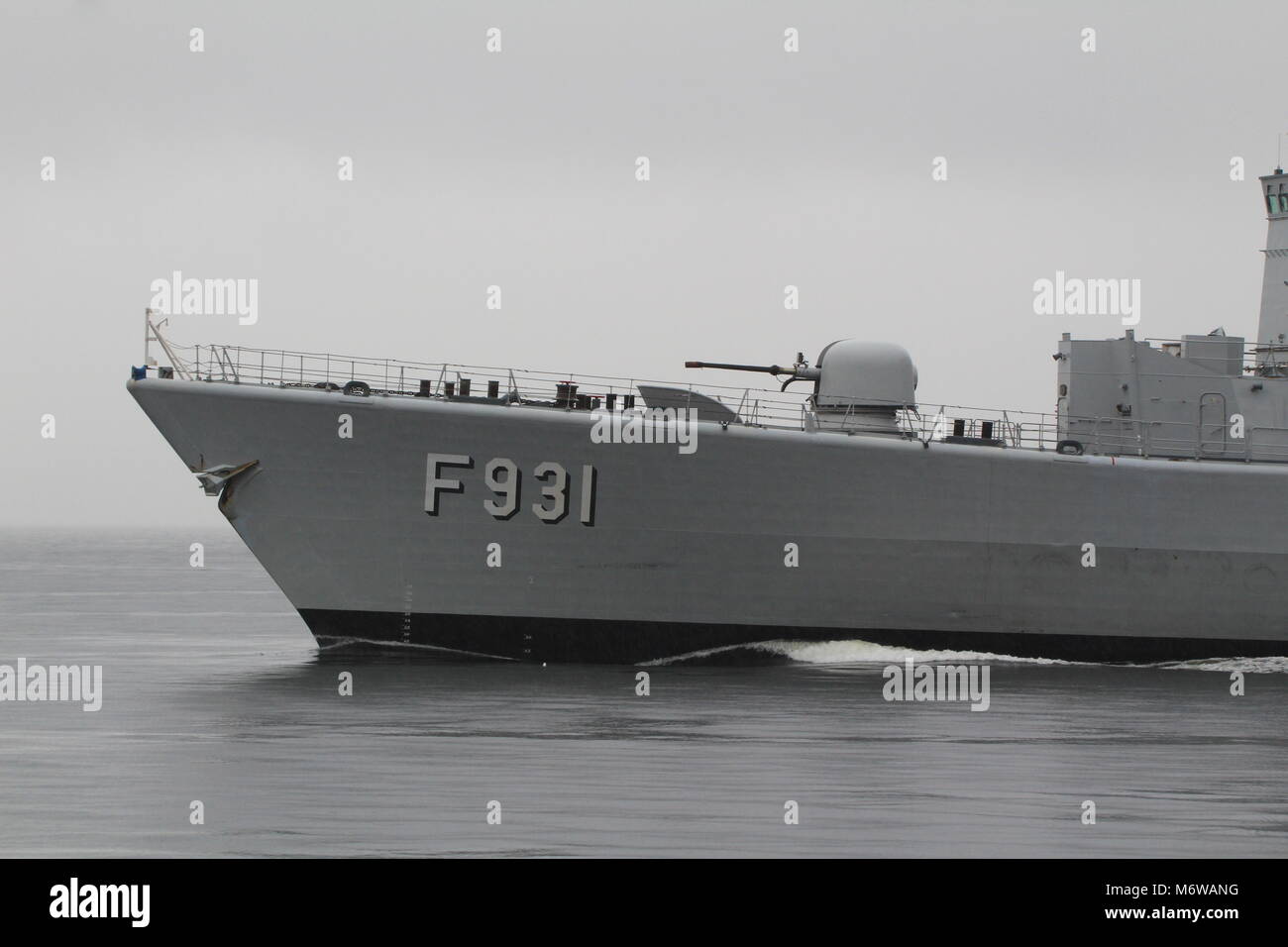 The prow of BNS Louise-Marie (F931), a Karel Doorman-class frigate operated by the Belgian Navy, showing the OTO Melara 76mm naval gun. Stock Photo