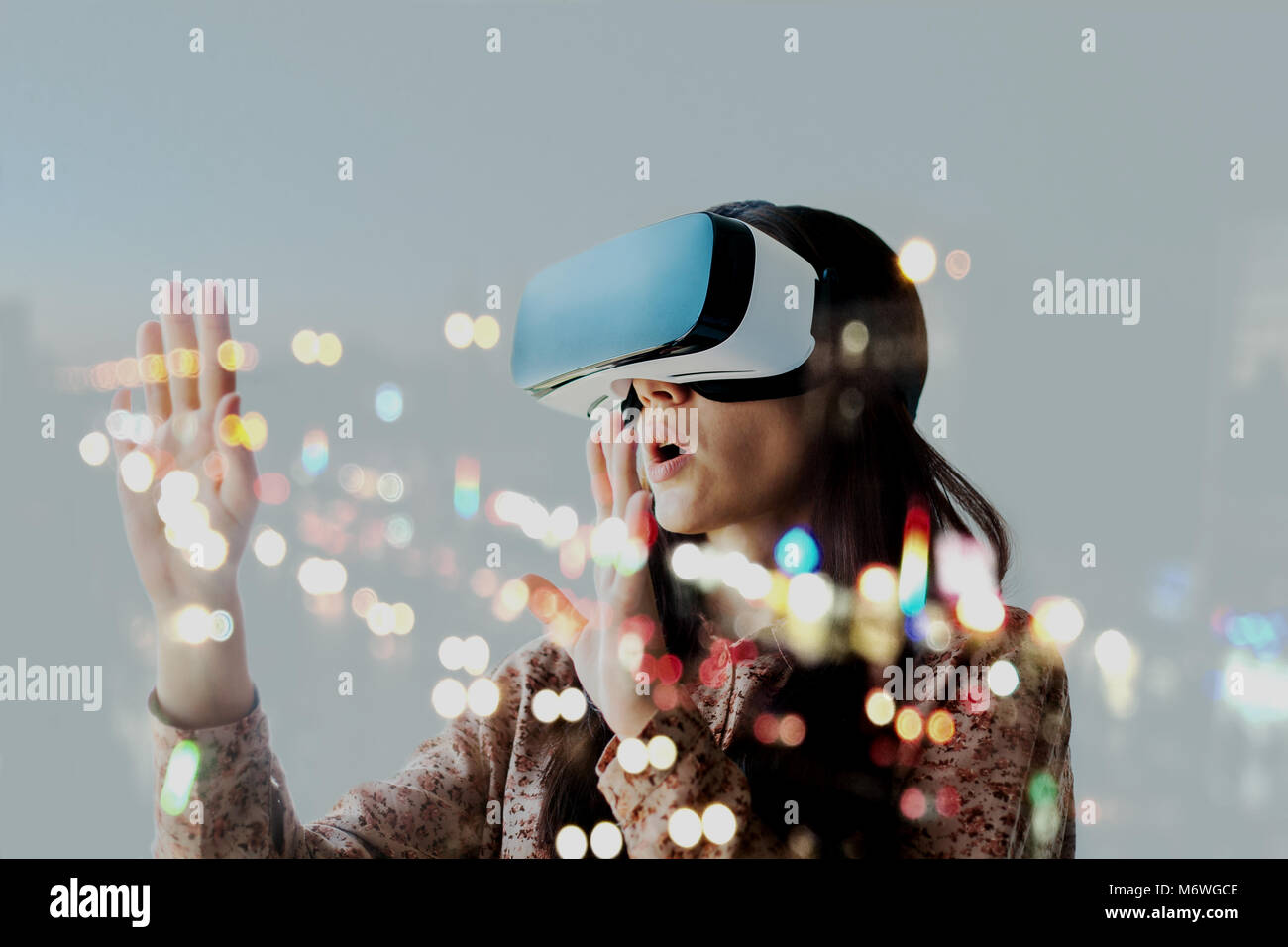 The woman with glasses of virtual reality. Future technology concept. Modern imaging technology