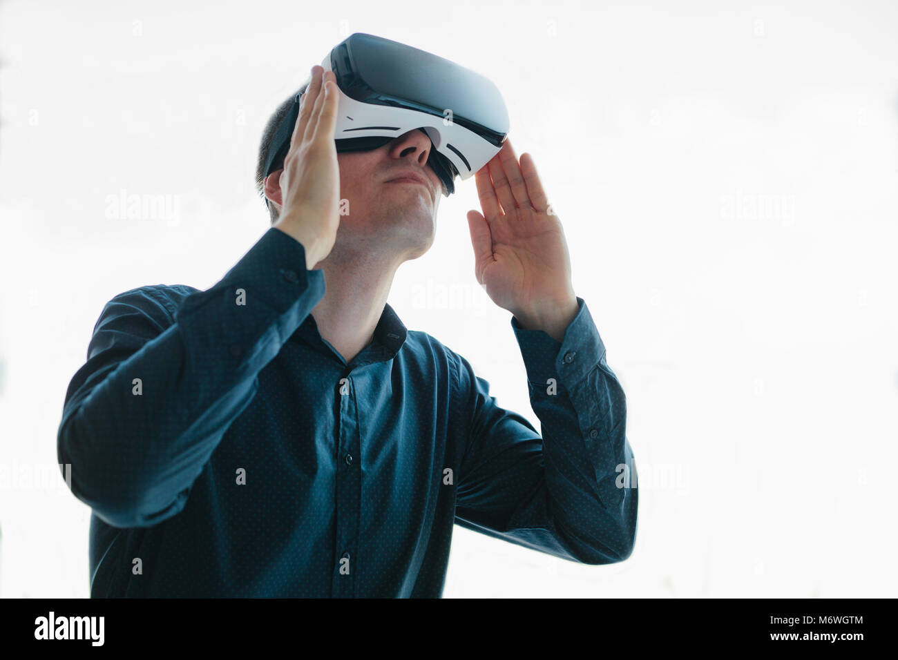 The man with glasses of virtual reality. Future technology concept