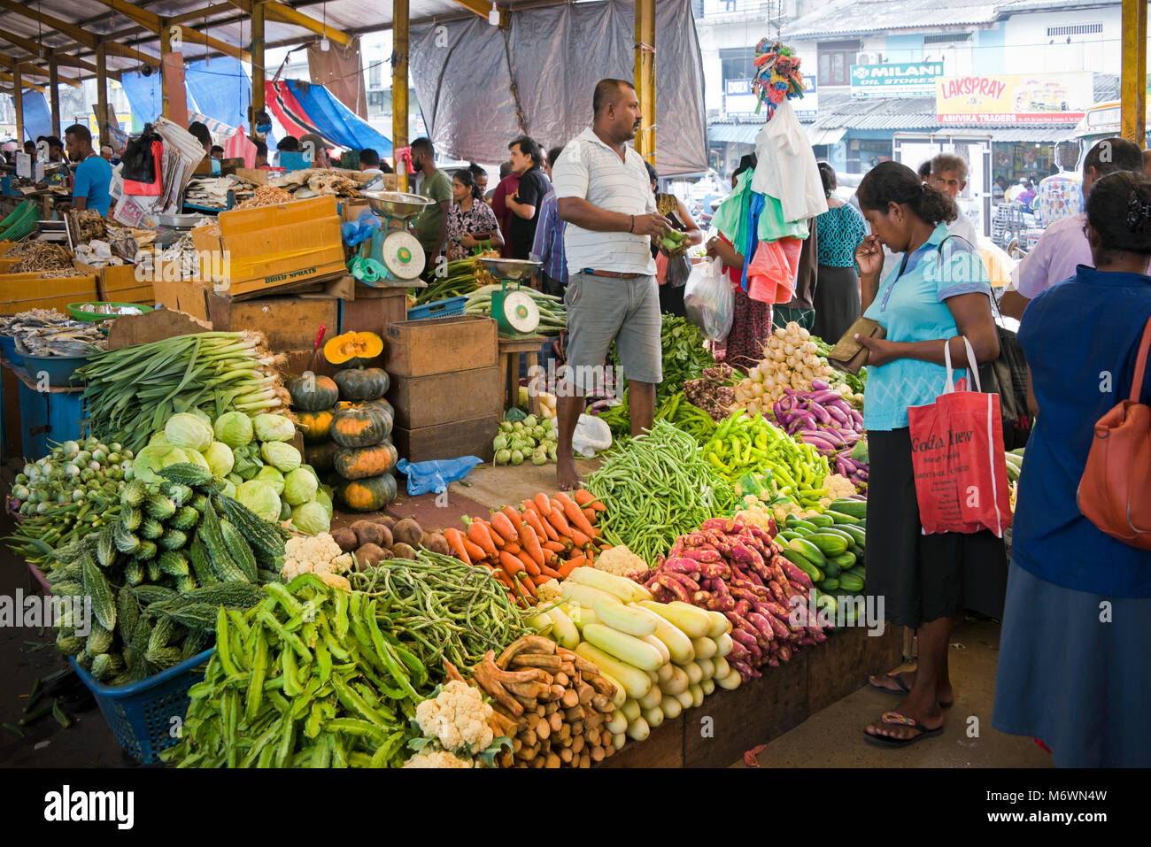 Horizontal view of fruit and vegetable stalls at Pettah market in Colombo, Sri Lanka. Stock Photo