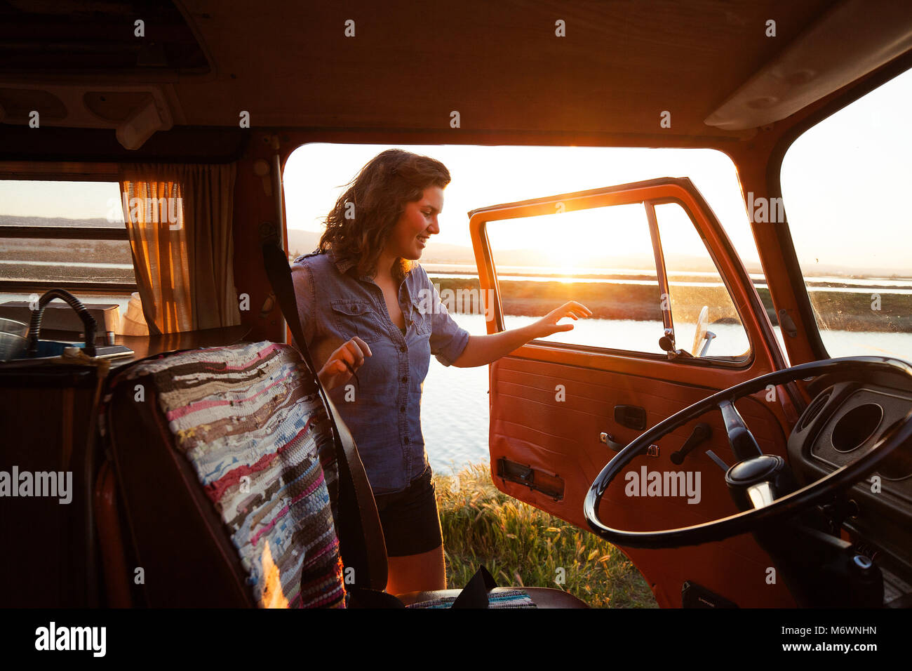 Woman in her van Stock Photo