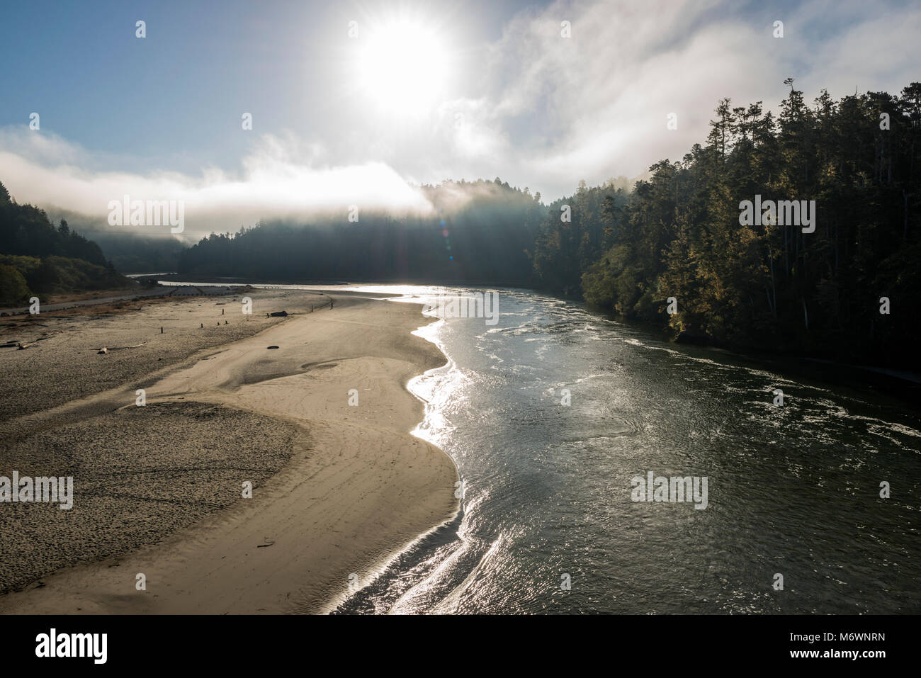 Beautiful morning light illuminates the Big River and beach in Mendocino, California. Stock Photo