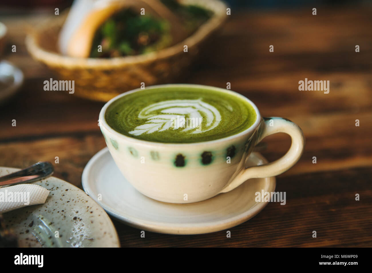 Close-up - ceramic cup with green tea called Matcha Stock Photo
