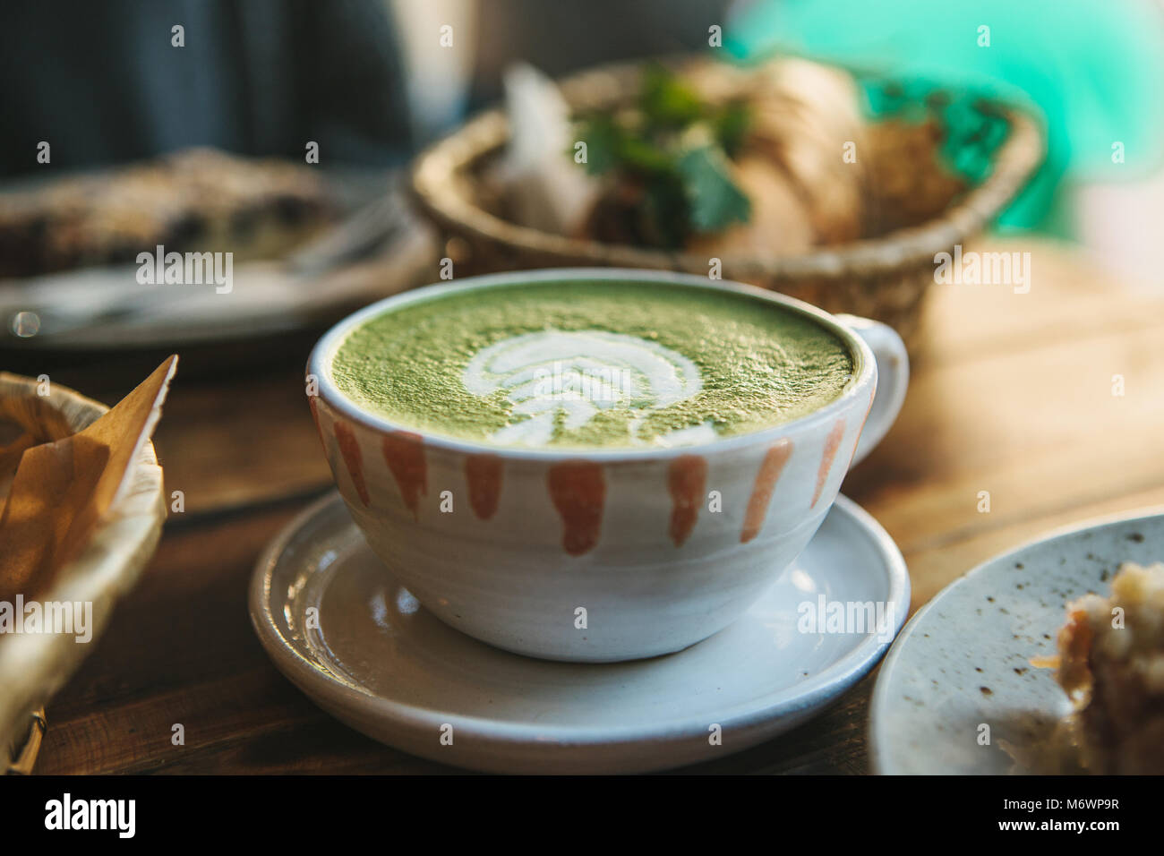 Close-up ceramic cup with green tea called Matcha Stock Photo