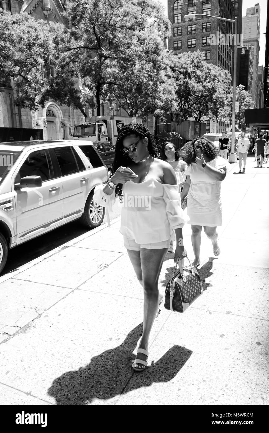 African woman street walking Black and White Stock Photos & Images - Alamy
