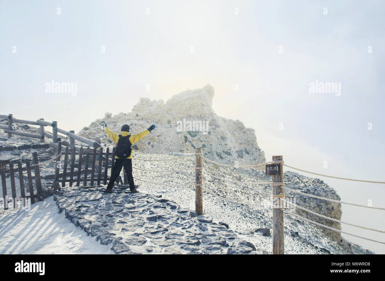 A tourist stands on the top of Changbai Mountain Stock Photo