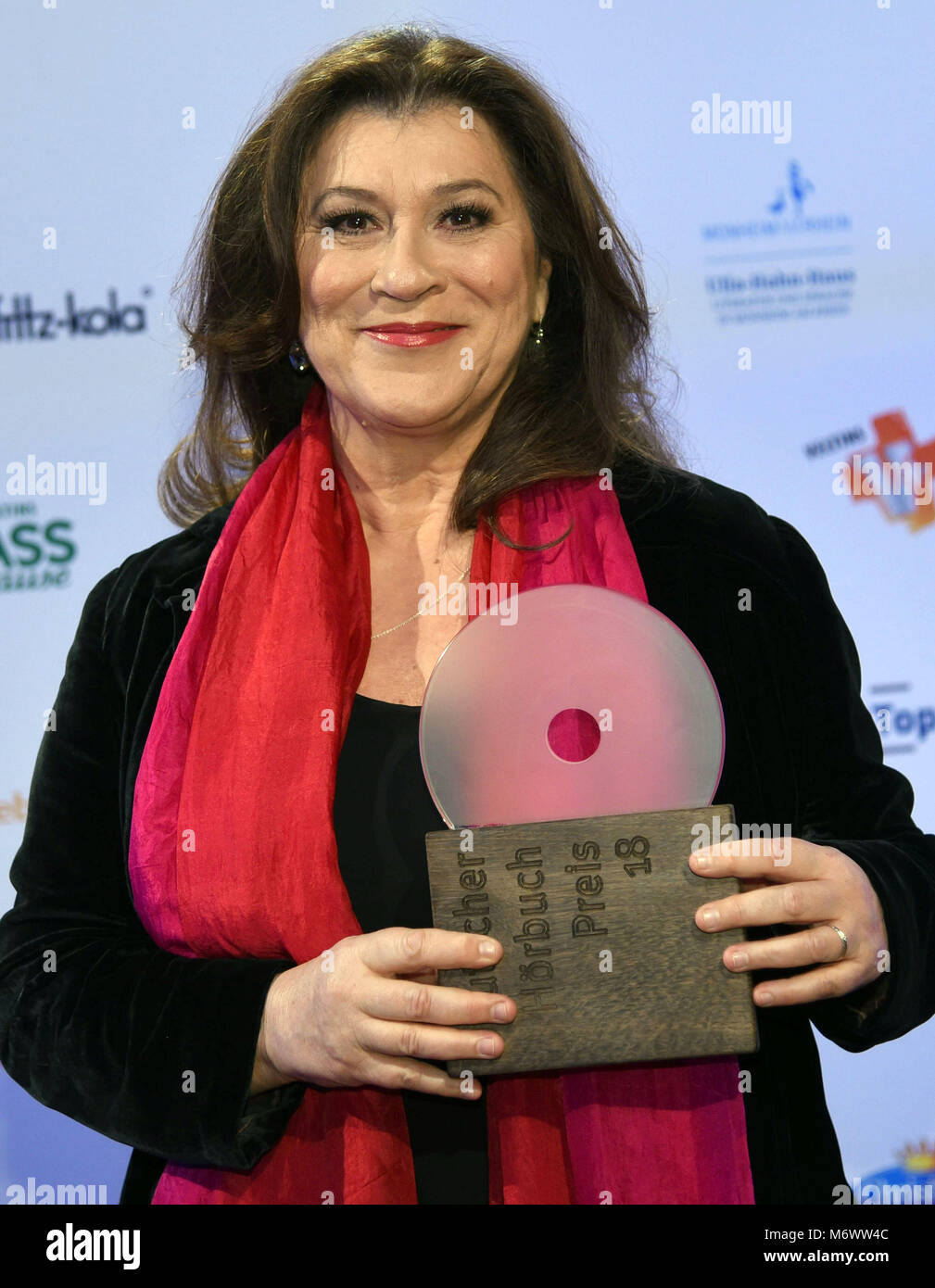 06 March 2018, Germany, Cologne: The actress Eva Mattes holding the 'special award' during a photo session before the award ceremony of the German audiobook awards. The ceremony also kickstarts the literature festival Lit.Cologne. Photo: Henning Kaiser/dpa Stock Photo