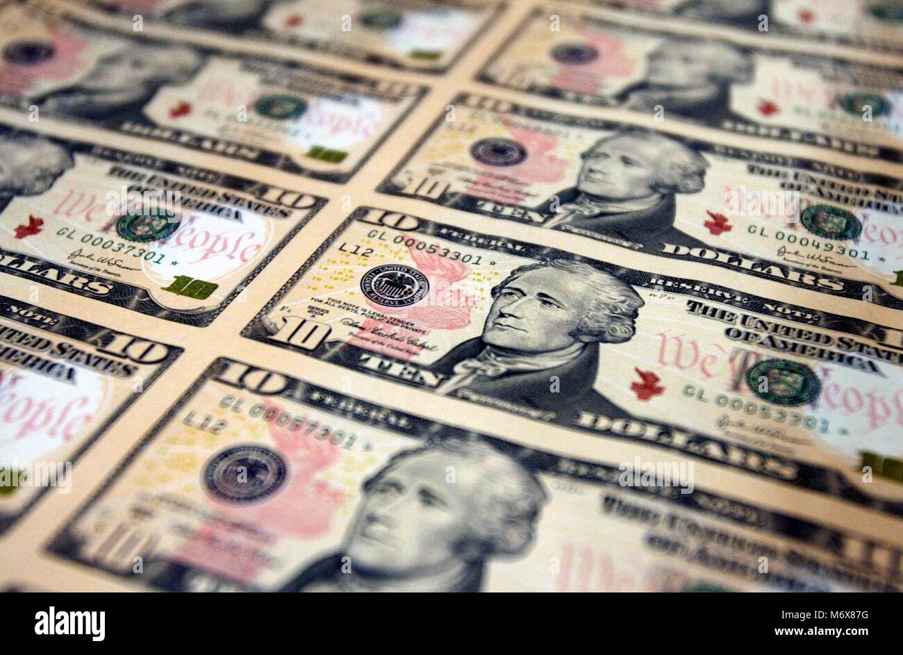 Beijing, China. 2nd Mar, 2006. This file photo taken on March 2, 2006 shows the United States 10-dollar bill. With the United States retreating to the stronghold of protectionism and nationalism, concerns about a trade war are rising around the globe. Credit: Lyu Mingxiang/TO GO WITH Xinhua Headlines: Trade war produces no winner/Xinhua/Alamy Live News Stock Photo