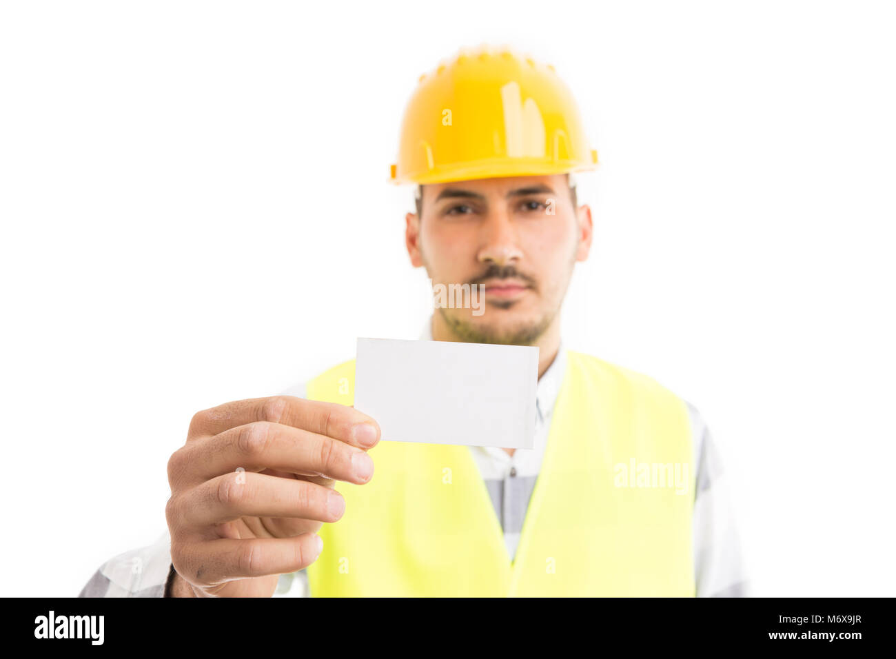 Trustful engineer or architect holding and showing white empty business card with  blank copy text area space Stock Photo