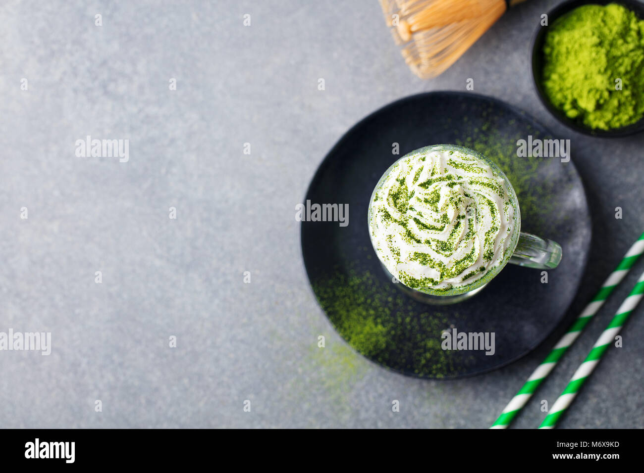 Matcha green tea latte, whipped cream. Copy space Stock Photo Alamy